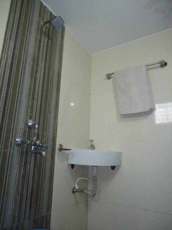 Hotel Sai Galaxy Inn 쉬르디 객실 사진