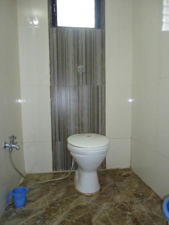 Hotel Sai Galaxy Inn 쉬르디 객실 사진