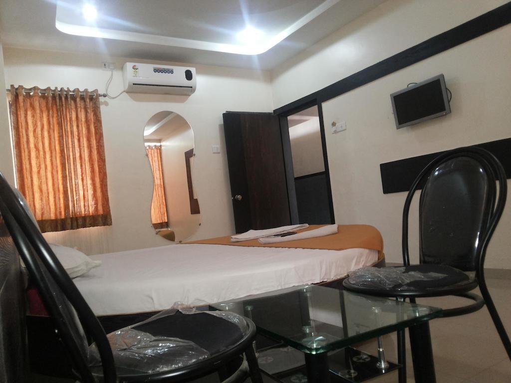 Hotel Sai Galaxy Inn 쉬르디 객실 사진
